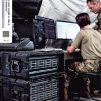 Peli Rack Cases Catalog Cover, where a Peli frame case protects military electronic equipment.