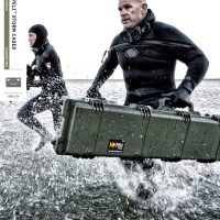 Peli Storm Cases Catalog Cover, where a soldier safely transports his firearm in a Peli Storm case.