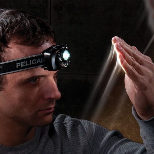 Peli headlamp tested on hands-free sensor by a researcher.